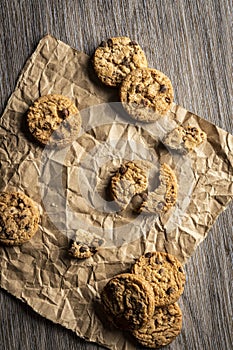 freshly baked Chocolate chip cookies on a wooden table with place for text