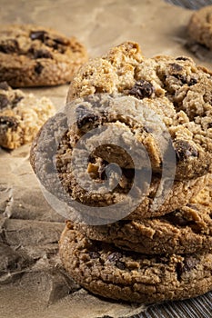 freshly baked Chocolate chip cookies on a wooden table with place for text
