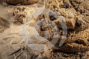 freshly baked Chocolate chip cookies on a wooden table with place for text