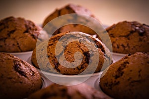 Freshly baked chocolate muffins close up shoot