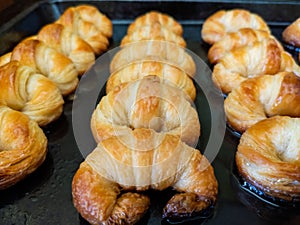 The middle croissant is mad at being cooked photo