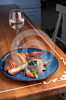 Freshly Baked Croissant with Liver Pate, Gourmet Appetizer on Table