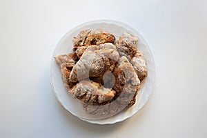 Freshly baked croissants on plate from above