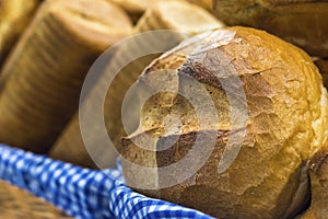 Freshly baked crusty loaves of bread in a basket