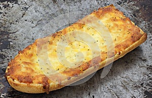 Freshly baked French bread cheese pizza