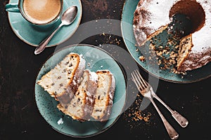 Freshly baked gugelhupf with a cup of coffee crema