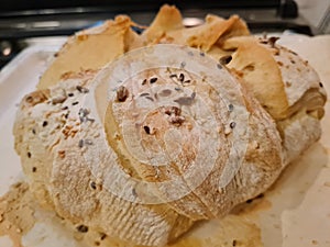 Freshly baked homemade bread loaf with seads straight from the oven