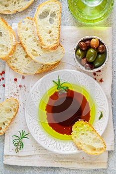 Freshly baked homemade ciabatta and a sauce of olive oil and balsamic vinegar