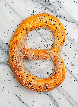 Freshly baked homemade Pretzel with black and white sesame seeds