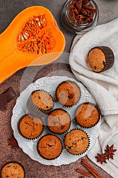 Freshly baked homemade pumpkin muffins with chocolate