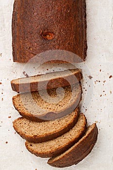 Freshly baked homemade sliced loaf of rye bread