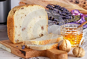 Freshly baked homemade wholegrain bread with walnuts, honey and lavender