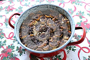 Freshly baked hungarian christmas mákos guba in a hot pan