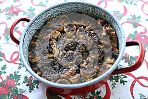 Freshly baked hungarian christmas mákos guba in a hot pan