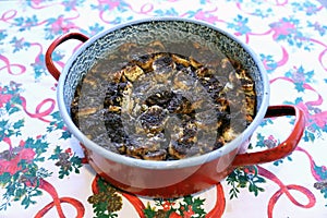 Freshly baked hungarian christmas mákos guba in a hot pan