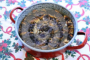 Freshly baked hungarian christmas mÃ¡kos guba in a hot pan