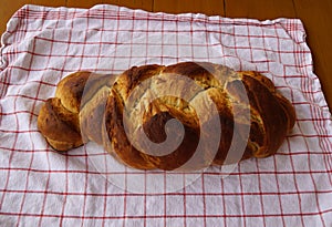 freshly baked loaf of rustic german home-made German Braid bread called Zopf with a beautiful brown crust