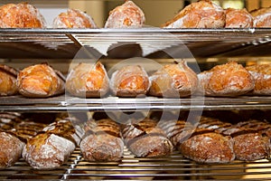 Freshly baked loaves of bread on a market stall