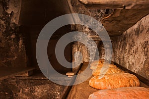 Freshly baked loaves of bread from an old oven