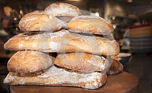 Freshly baked loaves of stacked bread