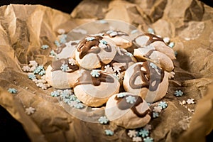 Freshly baked meringues on baking paper