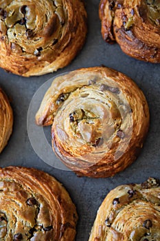 Freshly baked Pistachio - creme patissiere filled  snail  made of Croissant dough