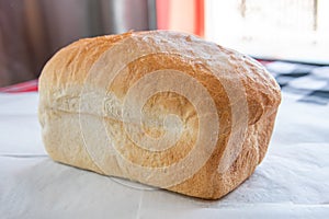 Fresh Home made bread loaf side view photo