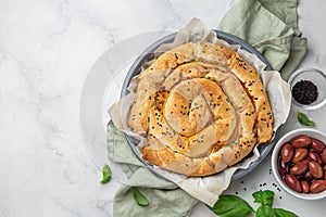 Freshly baked Spanakopita,  spiral filo pastry pie with feta cheese and spinach