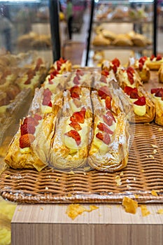 Freshly baked strawberry pastry and creamy custard at bakeshop