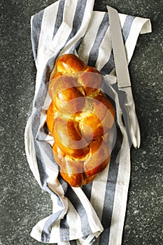 Freshly baked sweet braided bread loaf. Challah bread