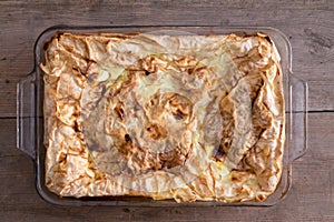 Freshly baked Turkish borek in an oven dish photo