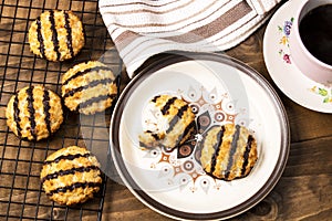 Freshly baked and warm coconut macaroons on a plate