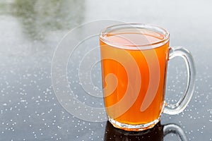 Freshly brewed black tea in glass mug, popularly known as Teh O in Malaysia photo