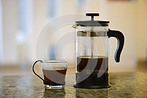 Freshly brewed coffee in french press coffee