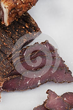 freshly carved traditional South African biltong a type of beef jerky