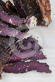 freshly carved traditional South African biltong a type of beef jerky