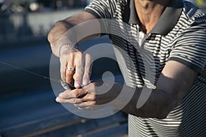 Freshly caught horse mackerel fish on a hook