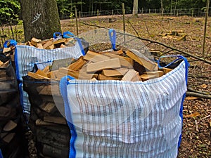 Freshly chopped fuel-wood in a bag