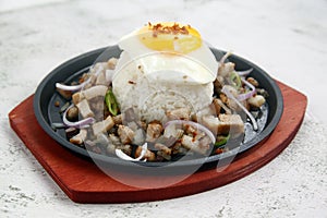 Freshly cooked Filipino food called Pork Sisig