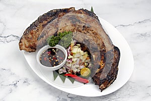 Freshly cooked grilled Tuna Panga or grilled tuna jaw