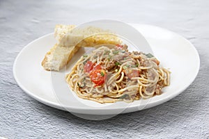 Freshly cooked Pasta with assorted toppings served with garlic bread