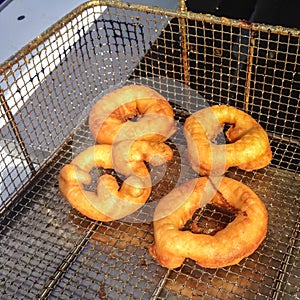 Freshly cooked ring doughnuts, donuts