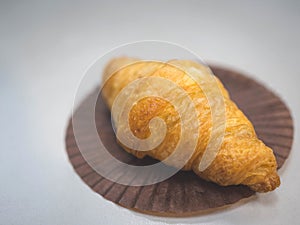 Freshly Croissant in baking paper