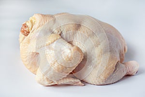 Freshly cut chicken on a white background,broiler carcass white chicken meat
