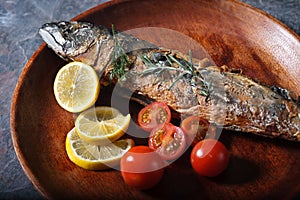 Freshly fried fish with vegetables