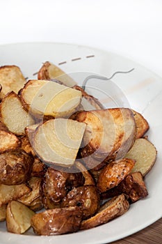 Freshly fryied young potatoes photo