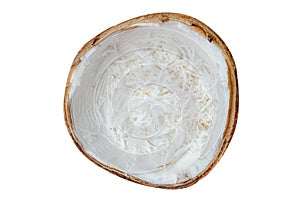 Freshly grated coconut in shell isolated