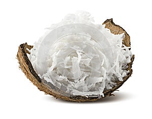 Freshly grated coconut in shell isolated on white background
