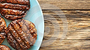 freshly grilled burger meat close-up, copy space, top view