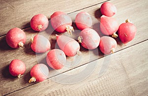 Freshly harvested radishes on a wooden surface vintage filter ap